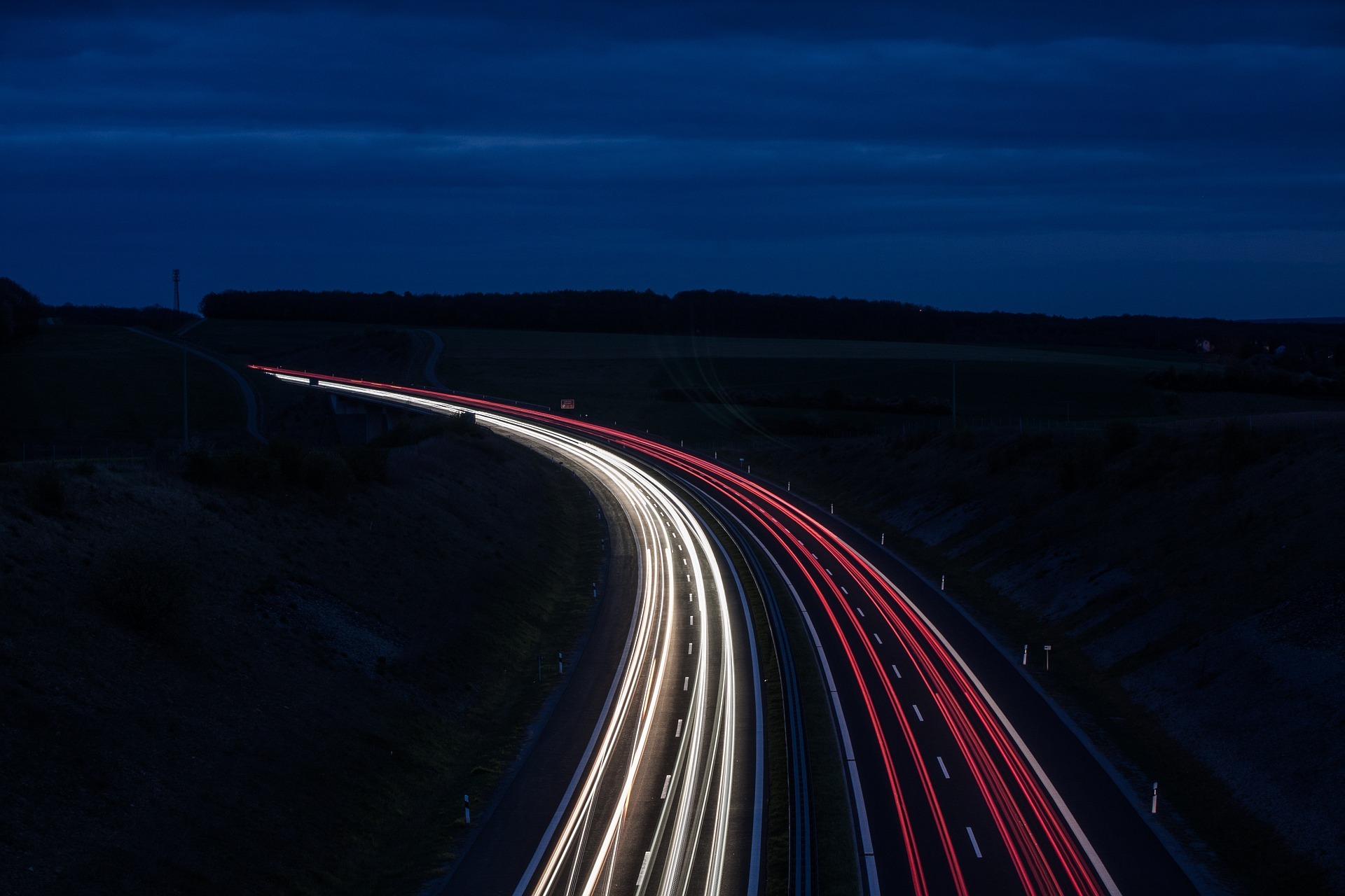 Vehicle lights on a South African road at night